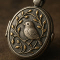 Antique Bronze Bird Locket Necklace: Engraved Vine Motif