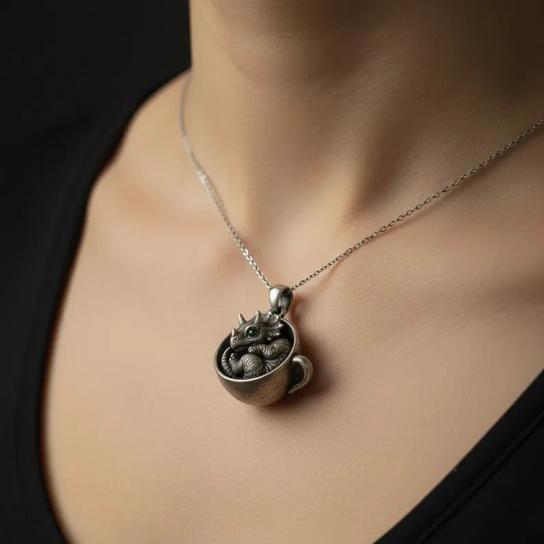 Silver Baby Dinosaur in Teacup Charm with Green Gem Eyes
