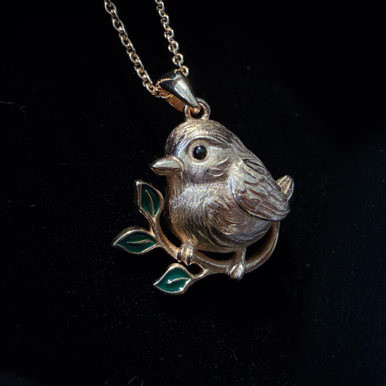 Handcrafted Bird Pendant Necklace: Bronze Sparrow with Green Enamel Leaves
